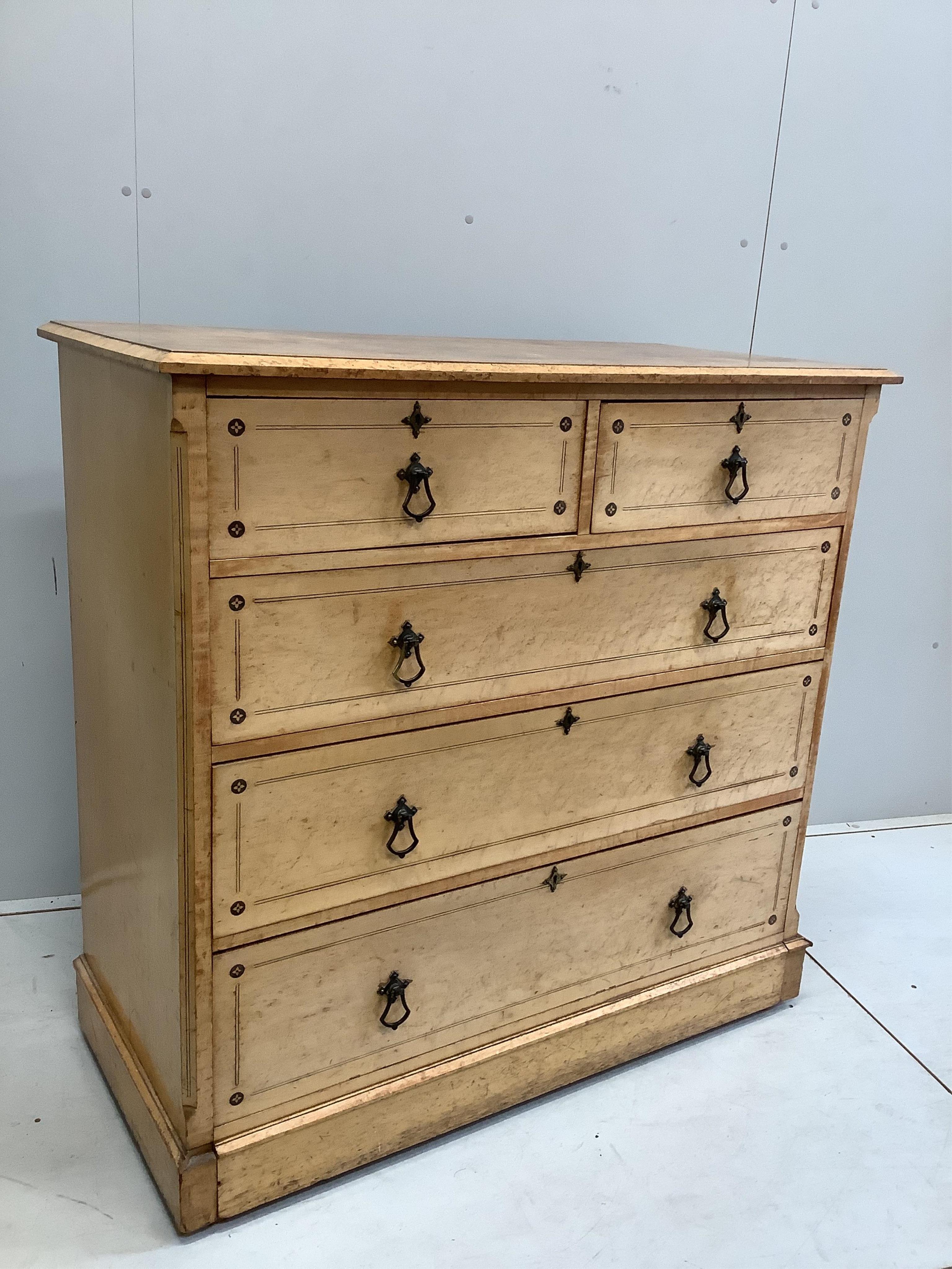 A late Victorian Gothic revival ebony inlaid, bird's eye maple bedroom suite, manner of Charles Bevan, comprising 5ft bed frame, kneehole dressing table, chest of drawers, marble top washstand, bedside cabinet, commode a